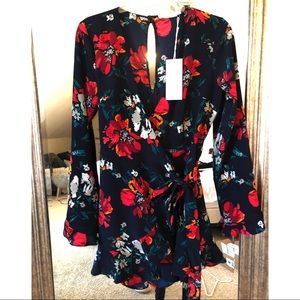 Navy blue romper with flowers